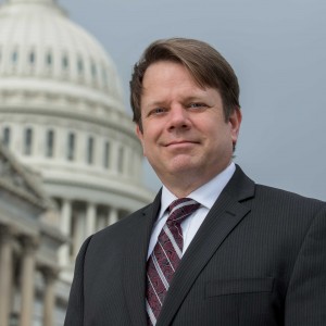 John Clocker standing outside of the Capitol building.